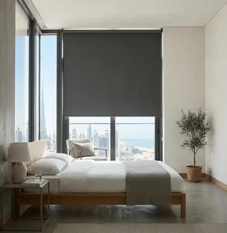 a blackout roller blinds in a highrise apartment bedroom Dubai